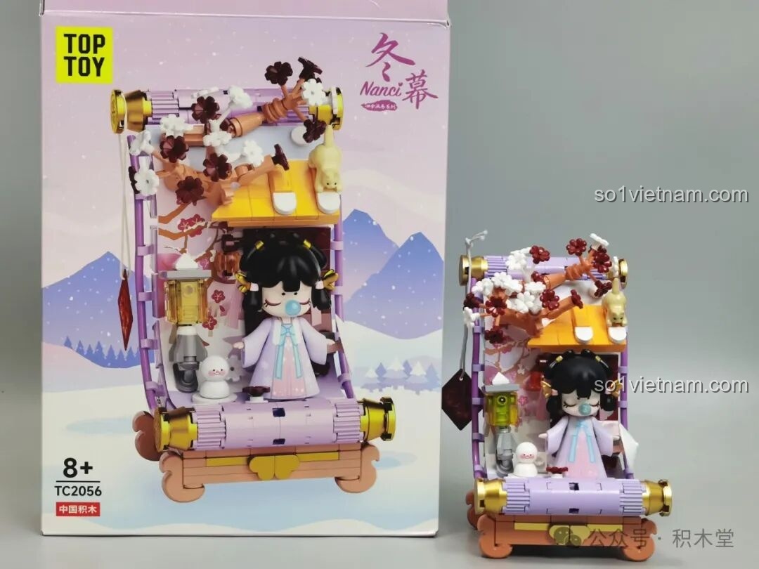 So sánh mô hình TOP TOY Nanci Mùa Đông sau khi lắp ráp với hình ảnh trên hộp.