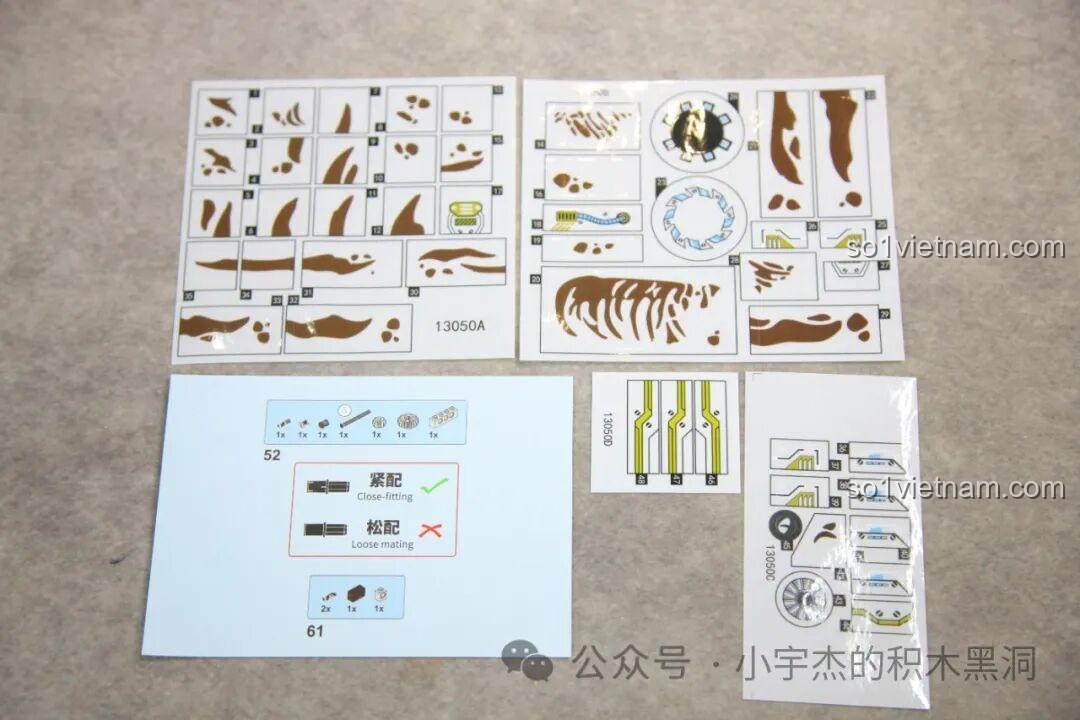 Các tấm sticker đi kèm để trang trí cho mô hình Cyborg T-Rex MJ, bao gồm cả tờ sửa lỗi.