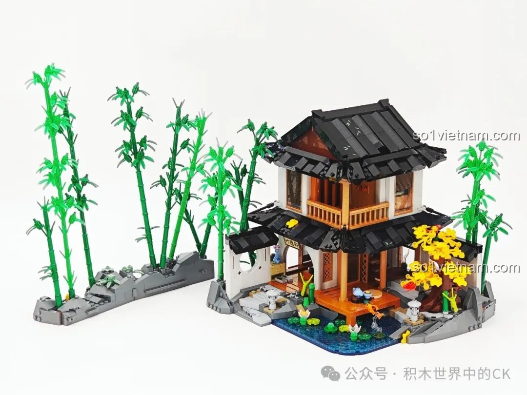 Thêm các chi tiết cây cảnh trang trí như cây hoa vàng để hoàn thiện cảnh quan cho bộ mô hình Lumibricks L9075.
