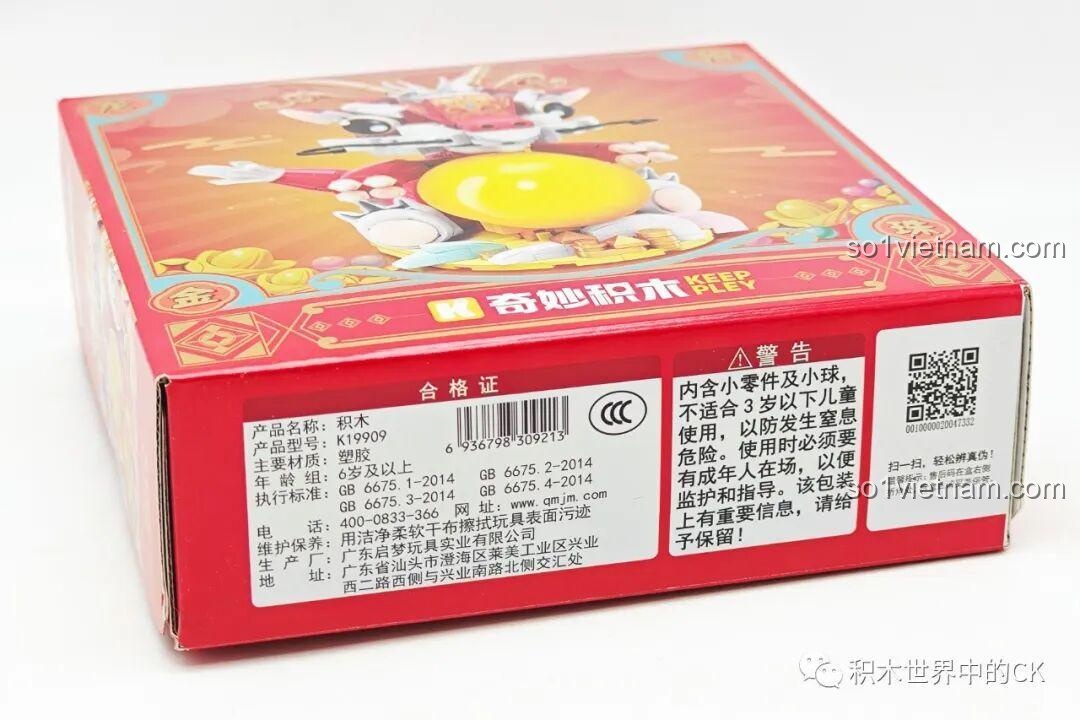 Thông tin chi tiết và cảnh báo an toàn trên hộp đồ chơi xây dựng Mô hình Rồng Vàng cho trẻ em 6+.