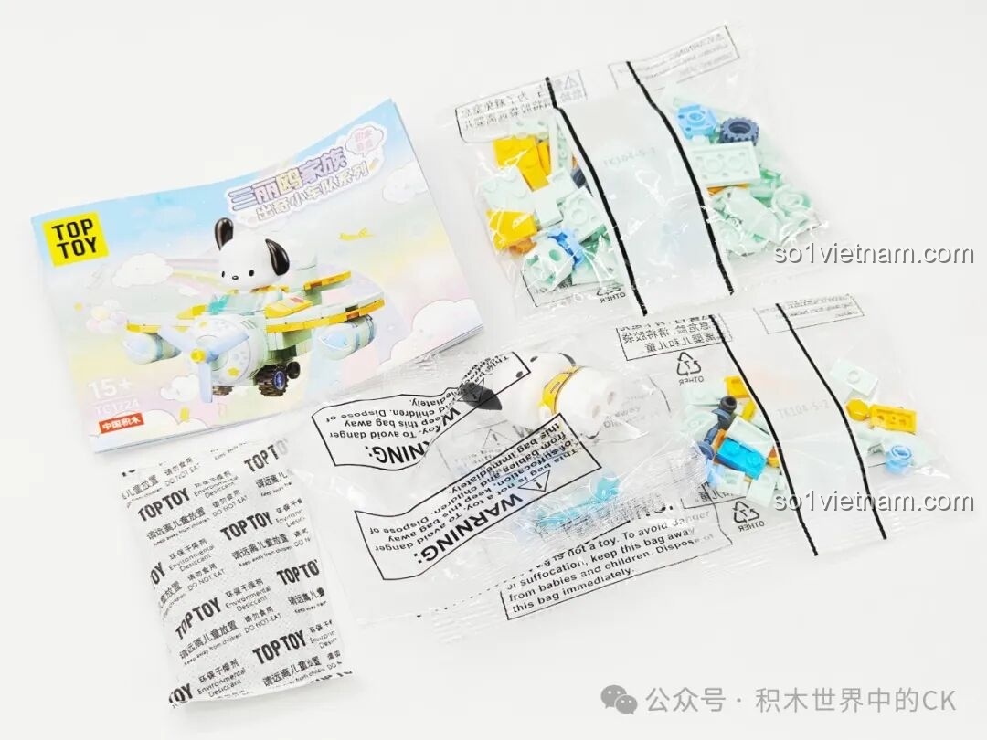 Túi mảnh ghép và sách hướng dẫn lắp ráp máy bay Pochacco trong bộ TOP TOY TC1724 Sanrio Characters.