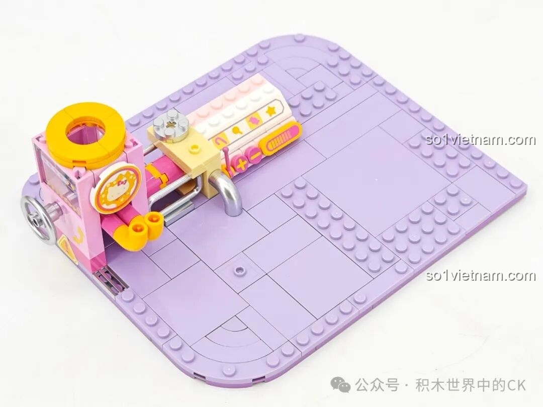 Chi tiết máy làm kẹo mút trong mô hình TOP TOY TC2069