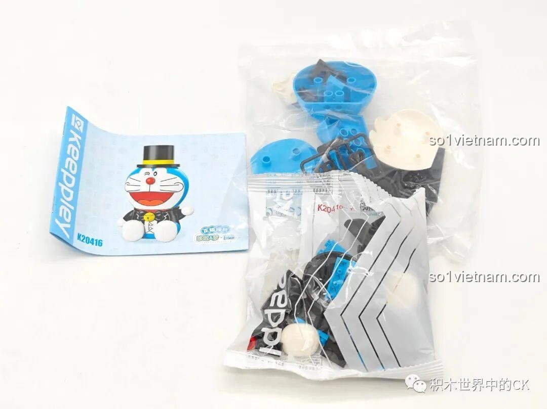 Các mảnh ghép và sách hướng dẫn của bộ lắp ghép Doraemon Phong Cách Anh Quốc K20416 được lấy ra khỏi hộp, sẵn sàng cho quá trình lắp ráp figure Keeppley 20416.
