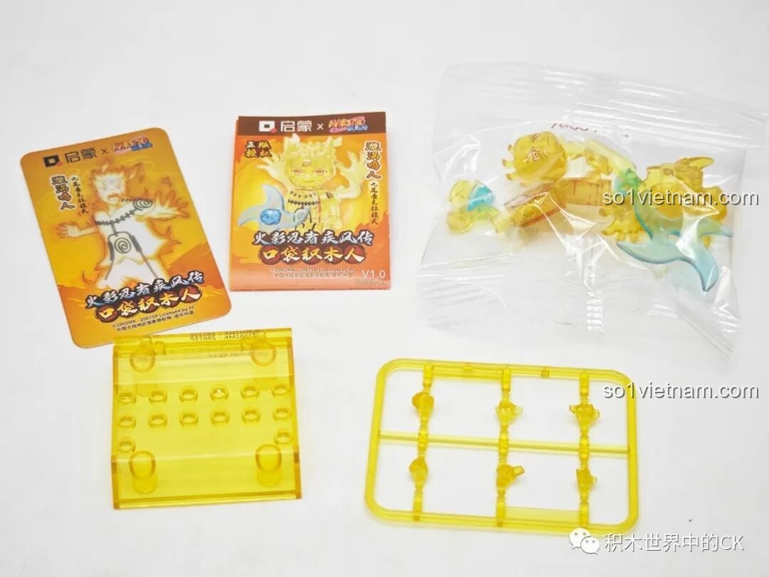 Mở hộp minifigure Naruto Chế độ Chakra Cửu Vĩ, bộ Qman 79001, các chi tiết làm từ nhựa trong suốt màu vàng.