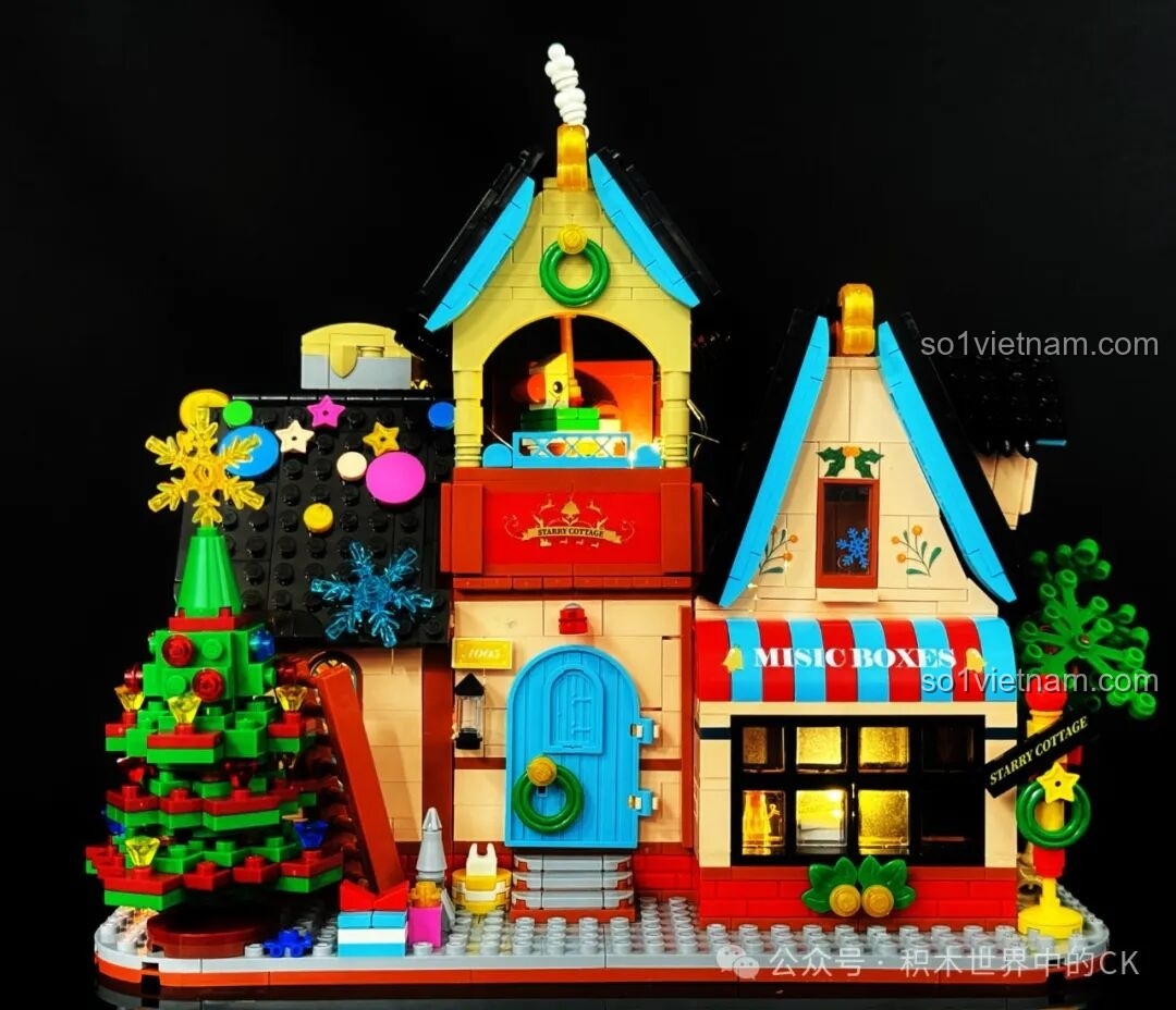 Mô hình ZHEGAO 613005 Ngôi Nhà Tinh Tú khi bật đèn LED, ánh sáng vàng ấm áp tỏa ra từ các ô cửa sổ.